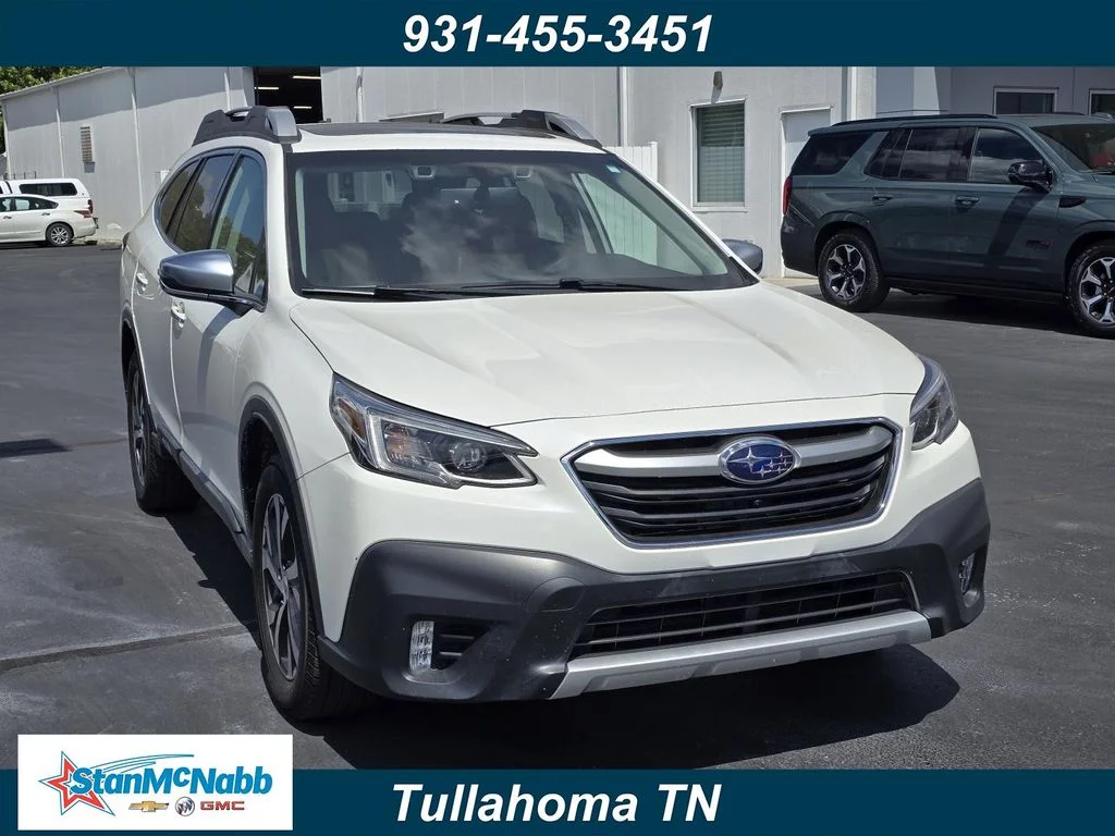 Used 2021 White Subaru Touring XT image 1