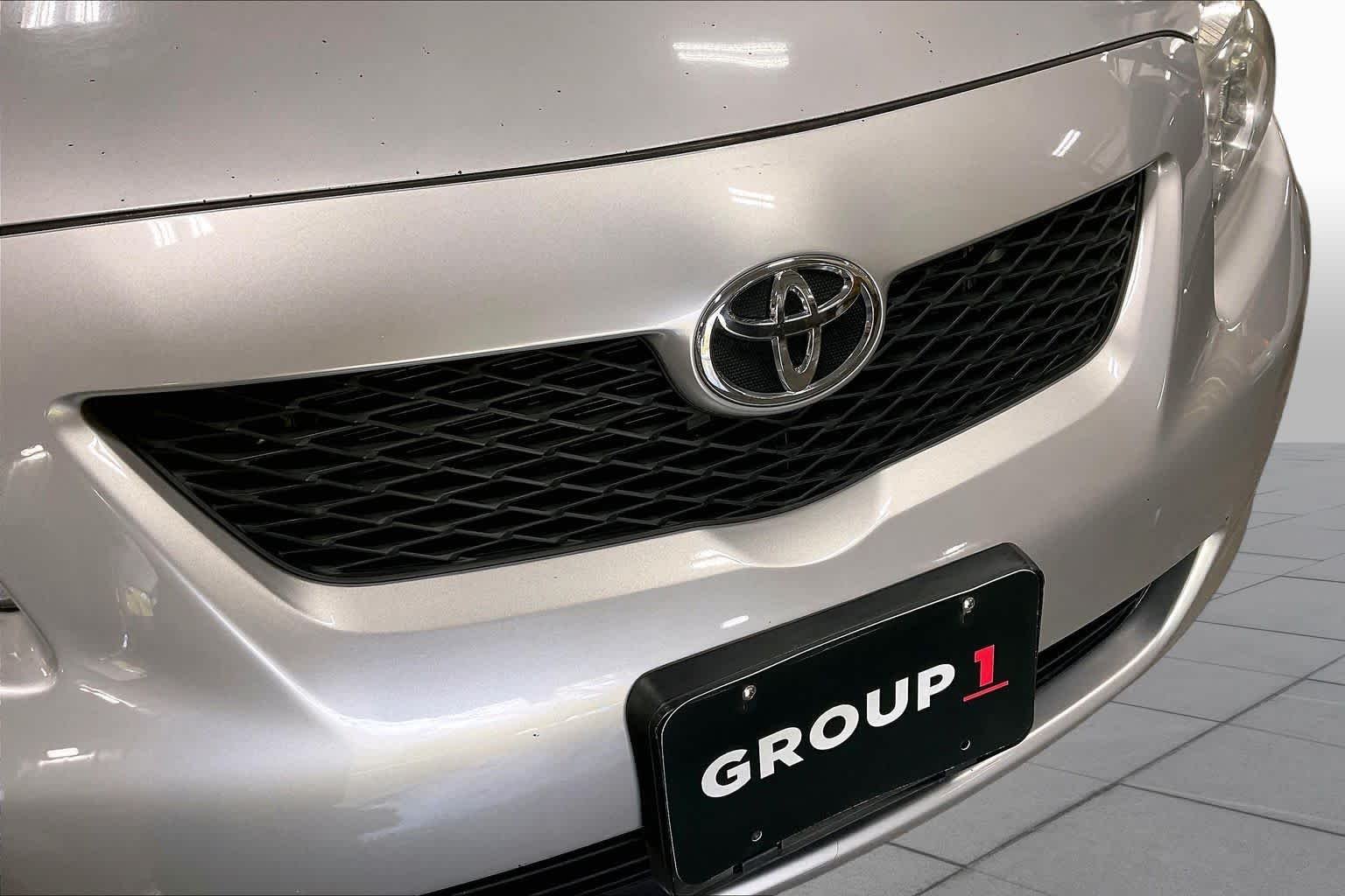Used 2010 Classic Silver Metallic Toyota LE image 28