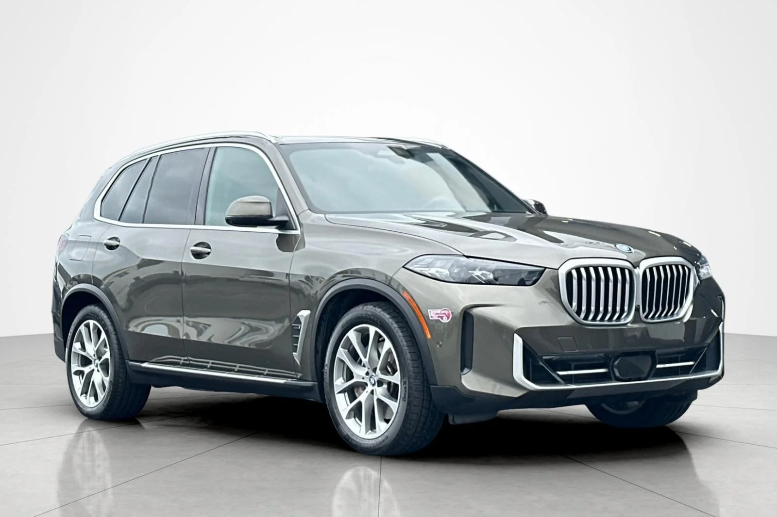 Used 2024 Manhattan Green Metallic BMW xDrive50e image 7