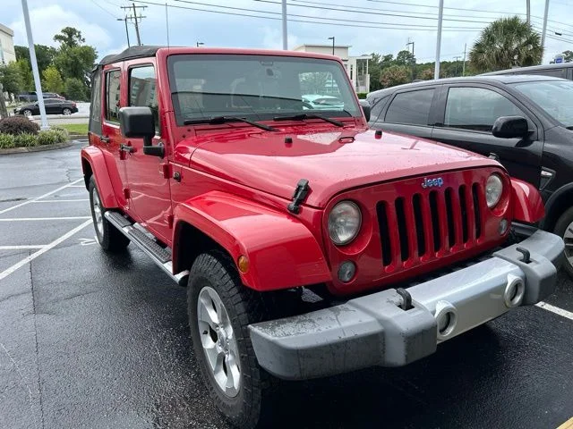 Used 2014 Red Jeep Unlimited Sahara image 7