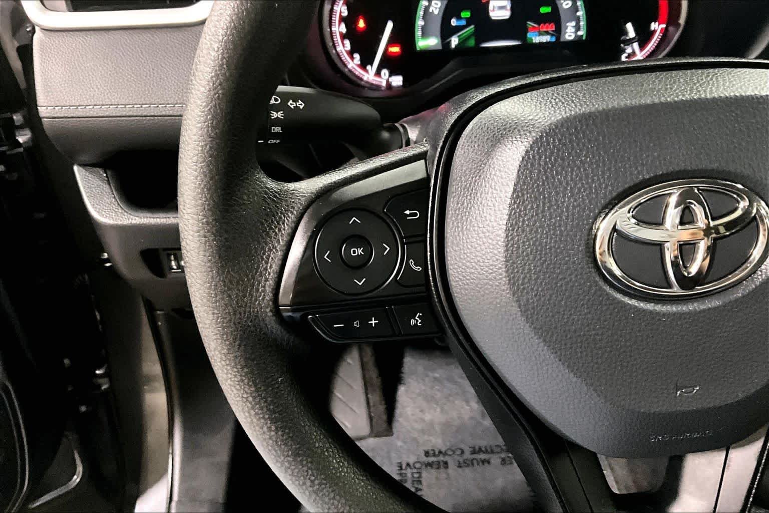 Used 2025 Magnetic Gray Metallic Toyota LE image 24