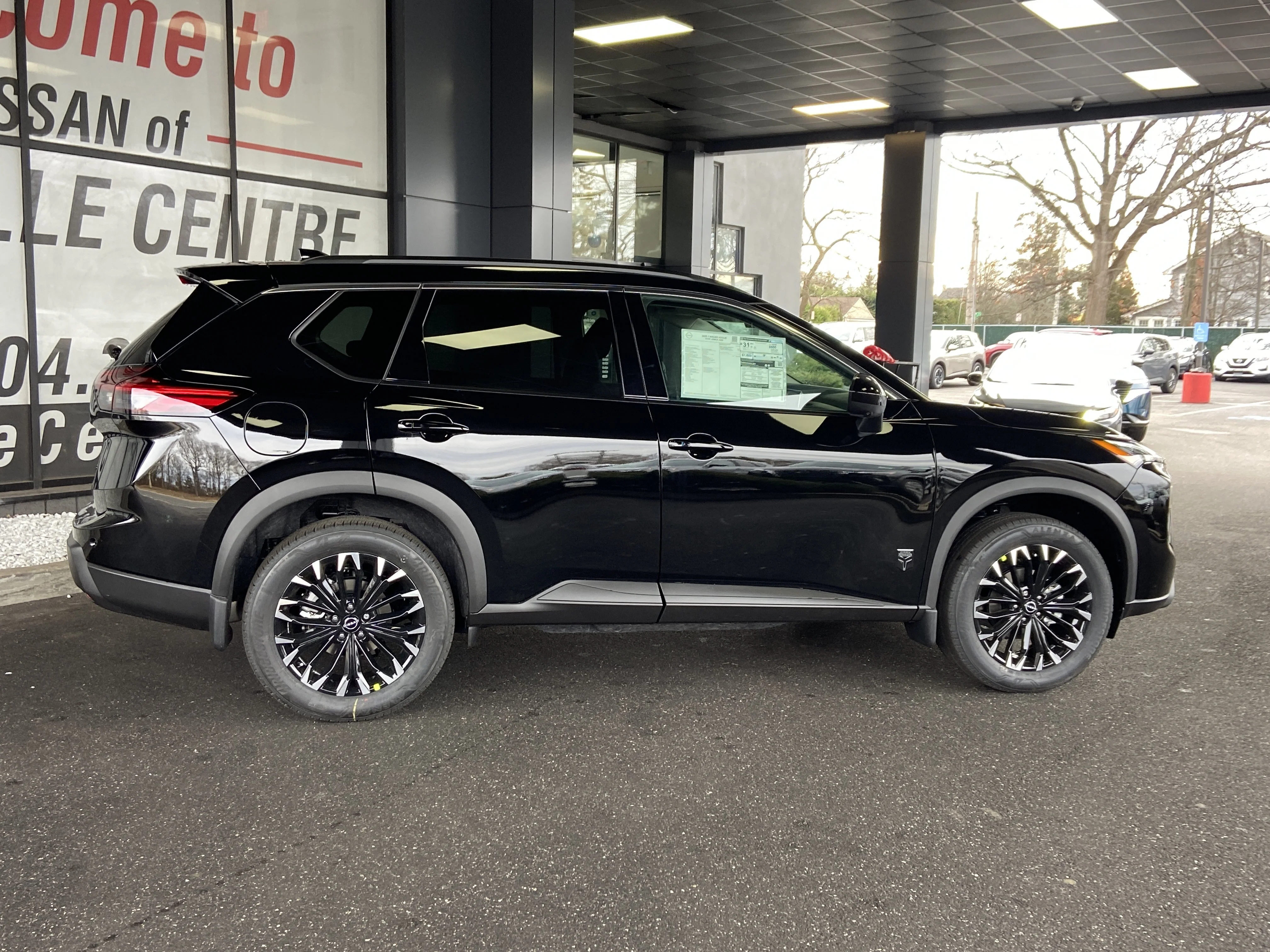 New 2026 Super Black Nissan Dark Armor image 3
