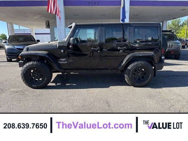 Used 2011 Black Jeep Unlimited Sahara image 7
