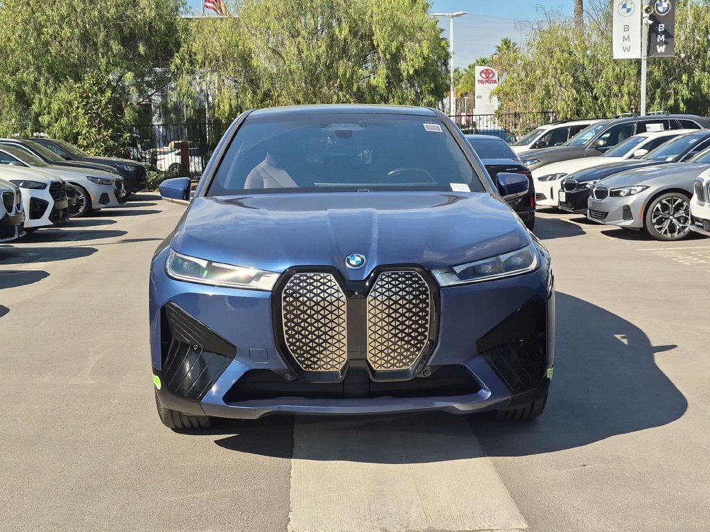 Used 2024 Blue BMW xDrive50 image 4
