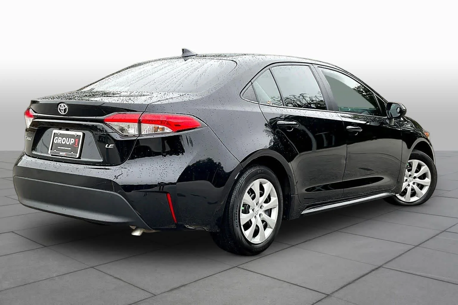 Used 2025 Midnight Black Metallic Toyota LE image 13