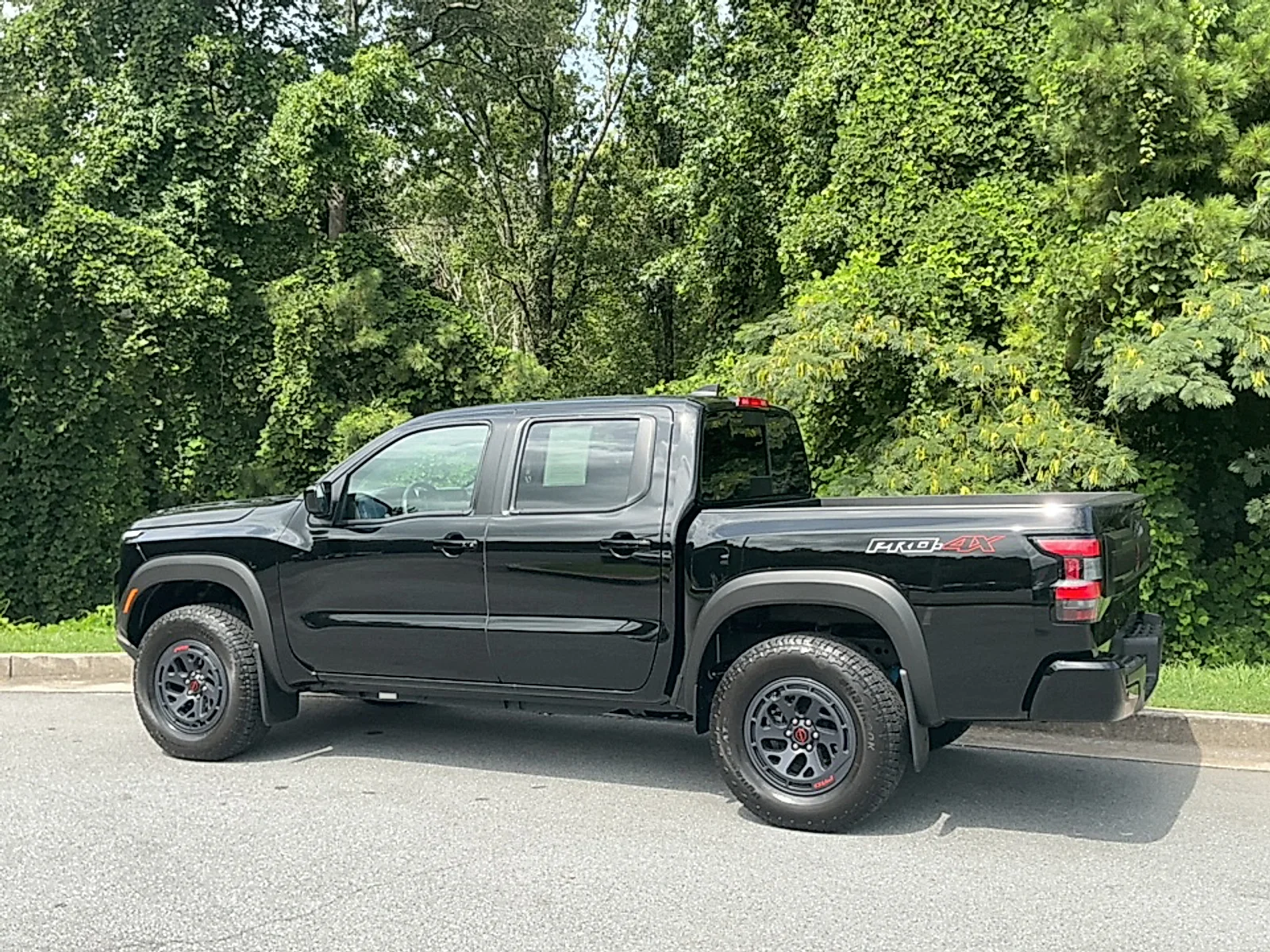 Used 2025 Super Black Nissan Crew Cab PRO-4X 4x4 image 3