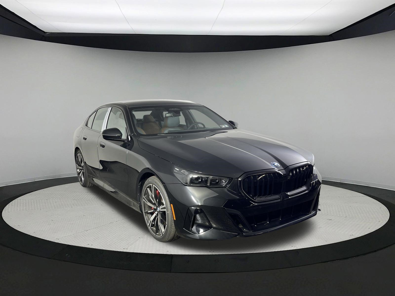 Used 2026 Black Sapphire Metallic BMW 550e xDrive image 3
