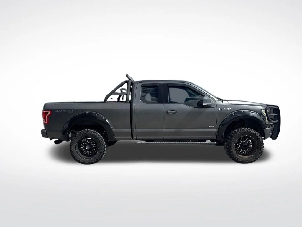 Used 2017 Shadow Black Ford Lariat image 4