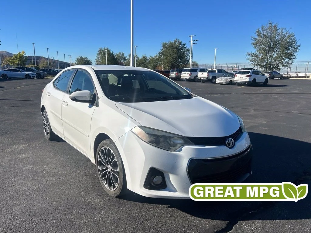 Used 2015 Super White Toyota S Plus image 1