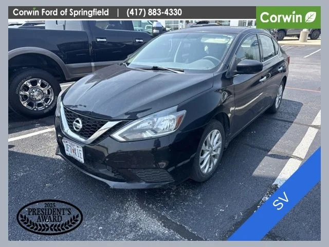 Used 2018 Super Black Nissan SV image 1