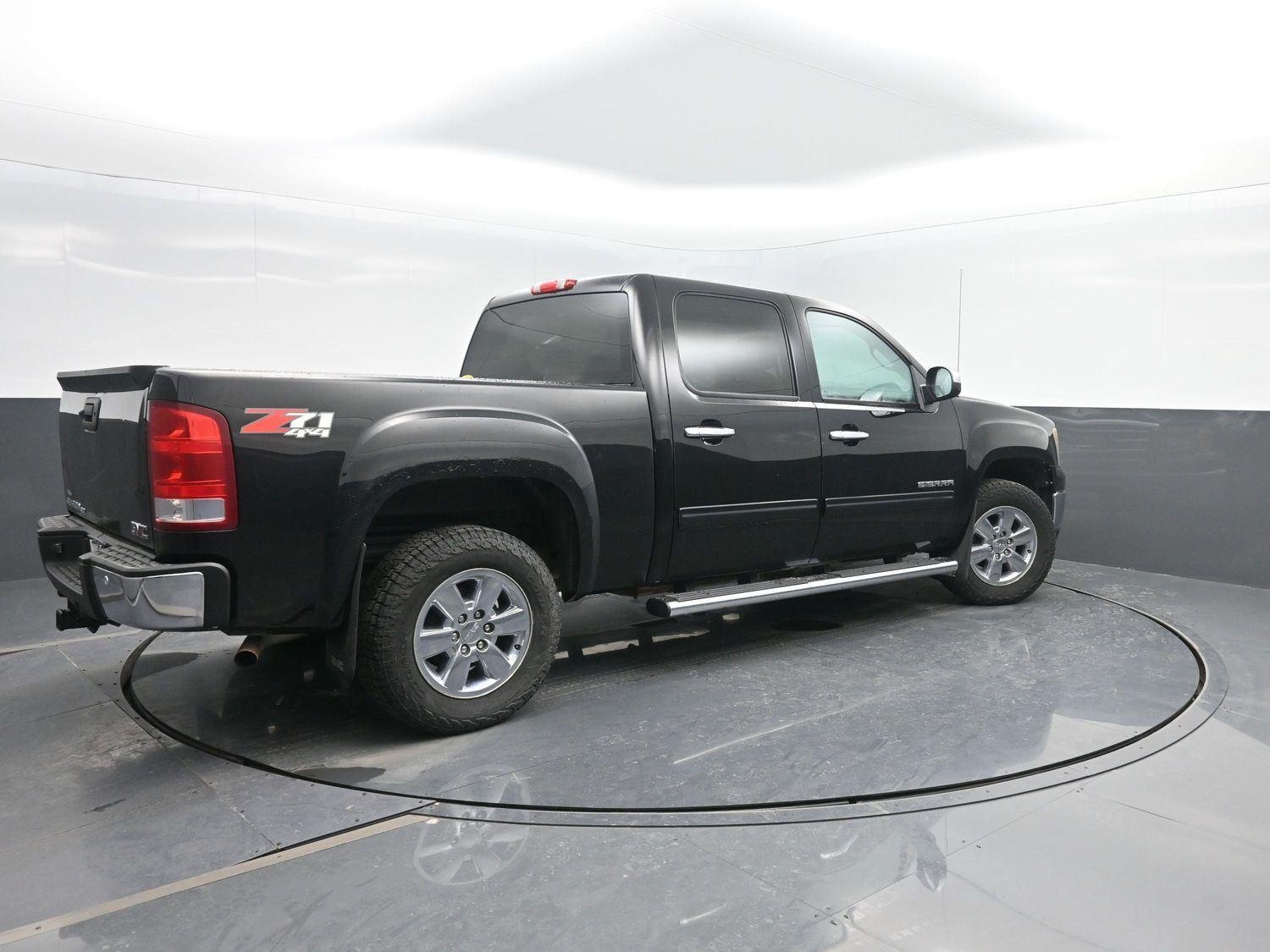 Used 2013 GMC Sierra 1500 SLT with VIN 3GTP2WE73DG146847 for sale in Charles City, IA