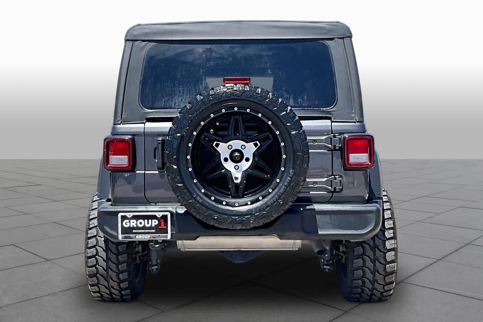 Used 2022 Granite Crystal Clearcoat Metallic Jeep Unlimited Sport S image 5