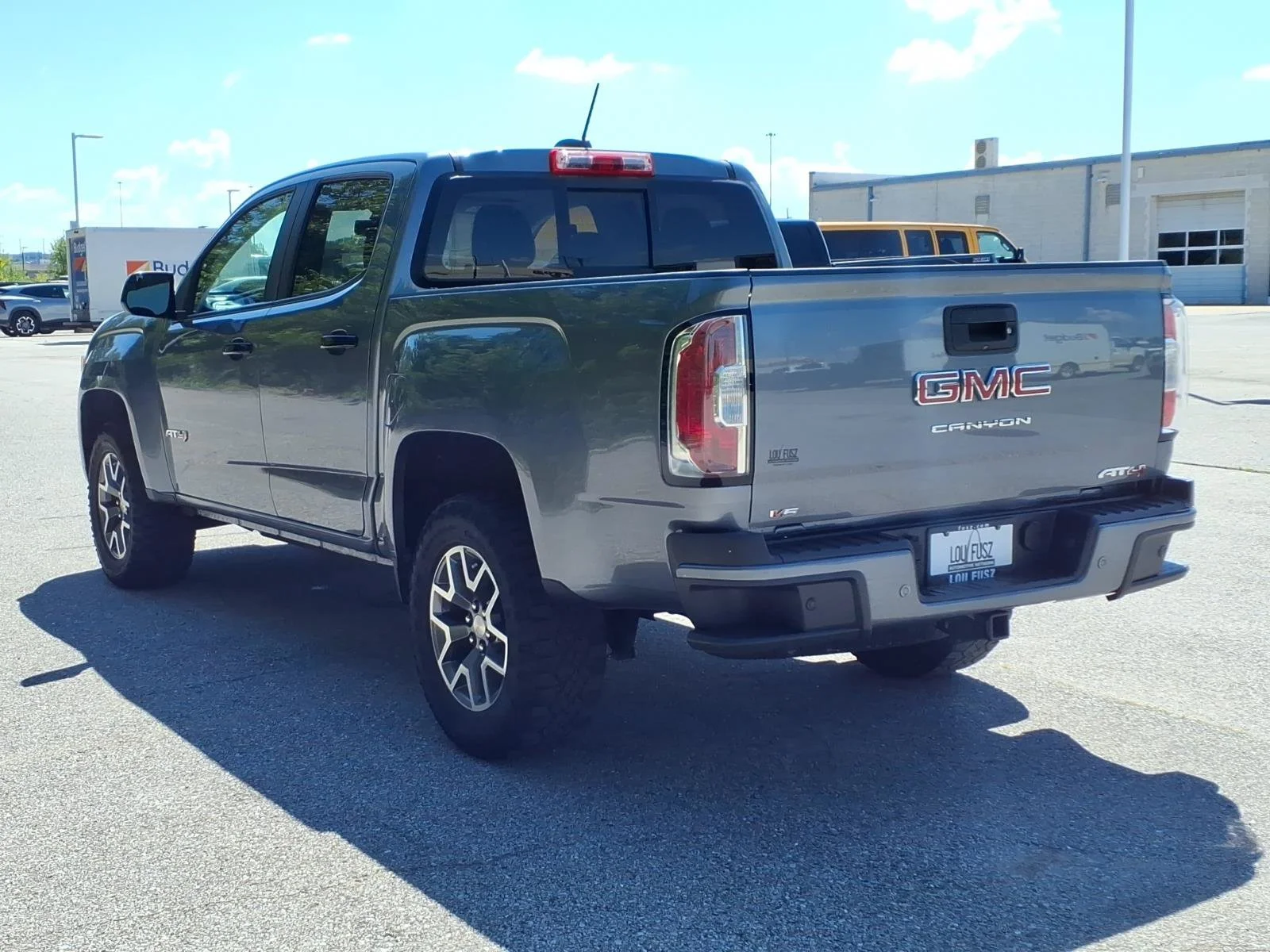 Used 2022 Satin Steel Metallic GMC 4WD AT4 with Leather image 5
