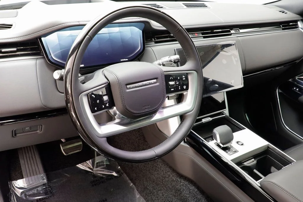 New 2025 Black Land Rover SE LWB 7 Passenger image 8