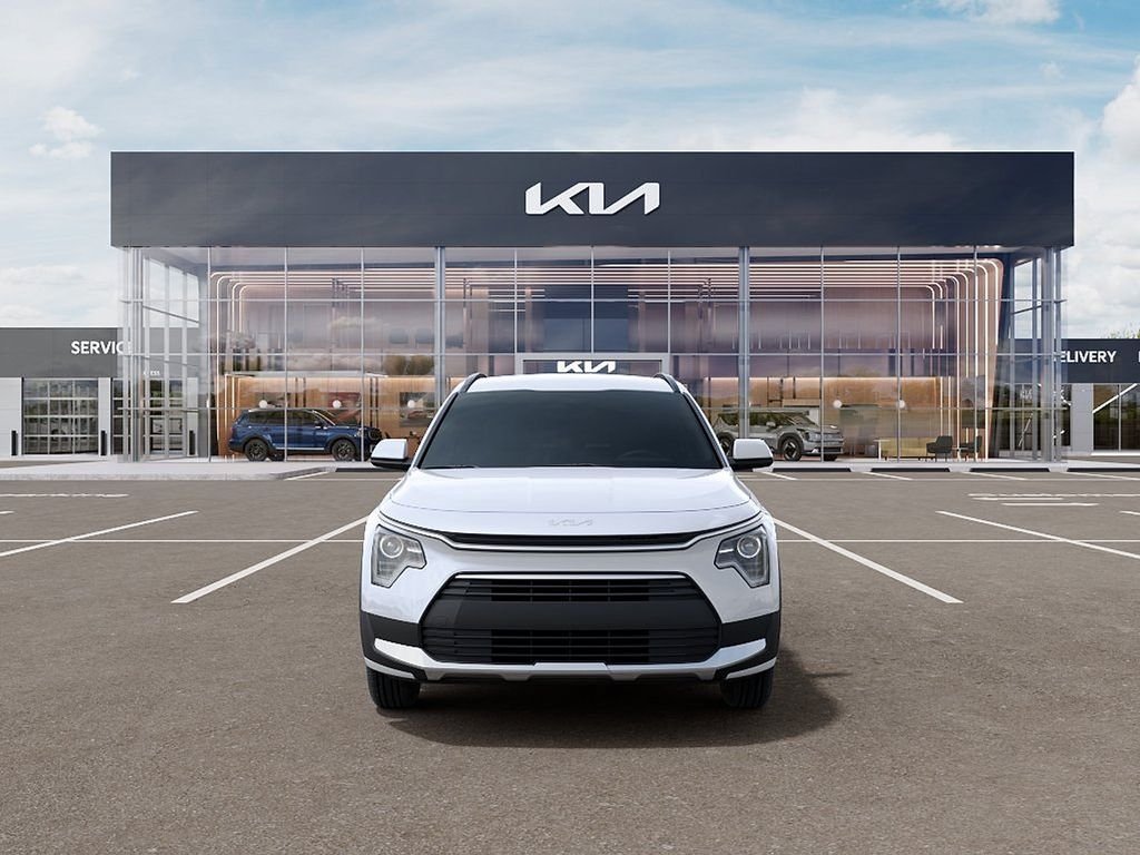 New 2026 Snow White Pearl Kia LX image 2