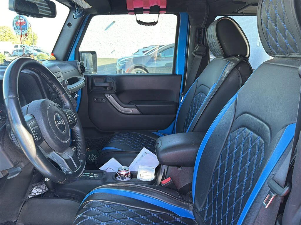 Used 2015 Hydro Blue Pearl Coat Jeep Sport image 1