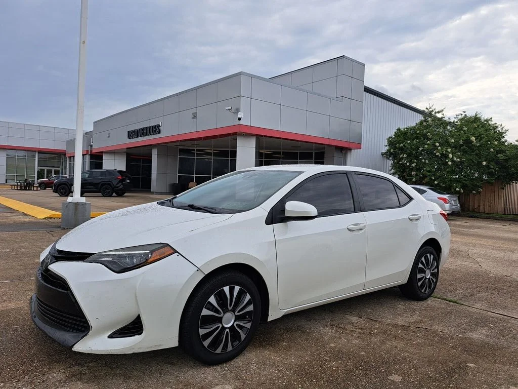Used 2018 White Toyota LE image 1