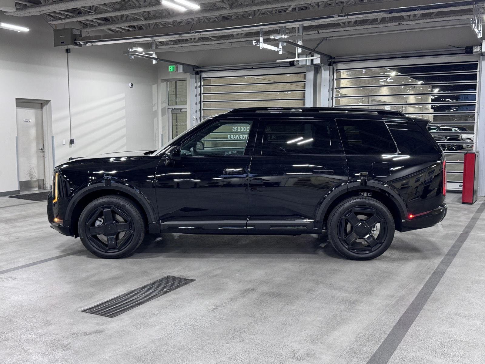 Used 2027 Ebony Black Kia X-Line EX image 2