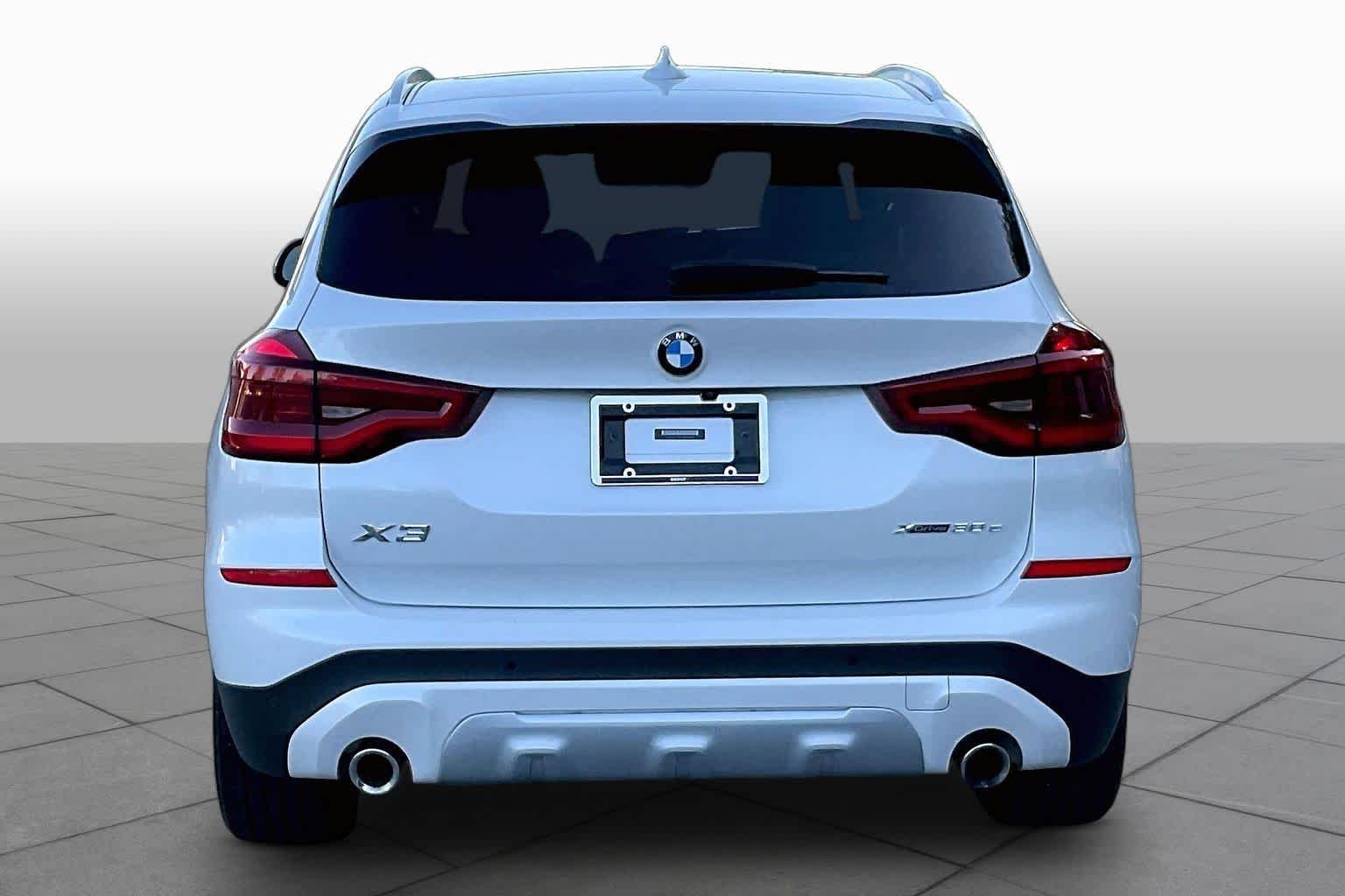 Used 2021 Mineral White Metallic BMW xDrive30e image 4