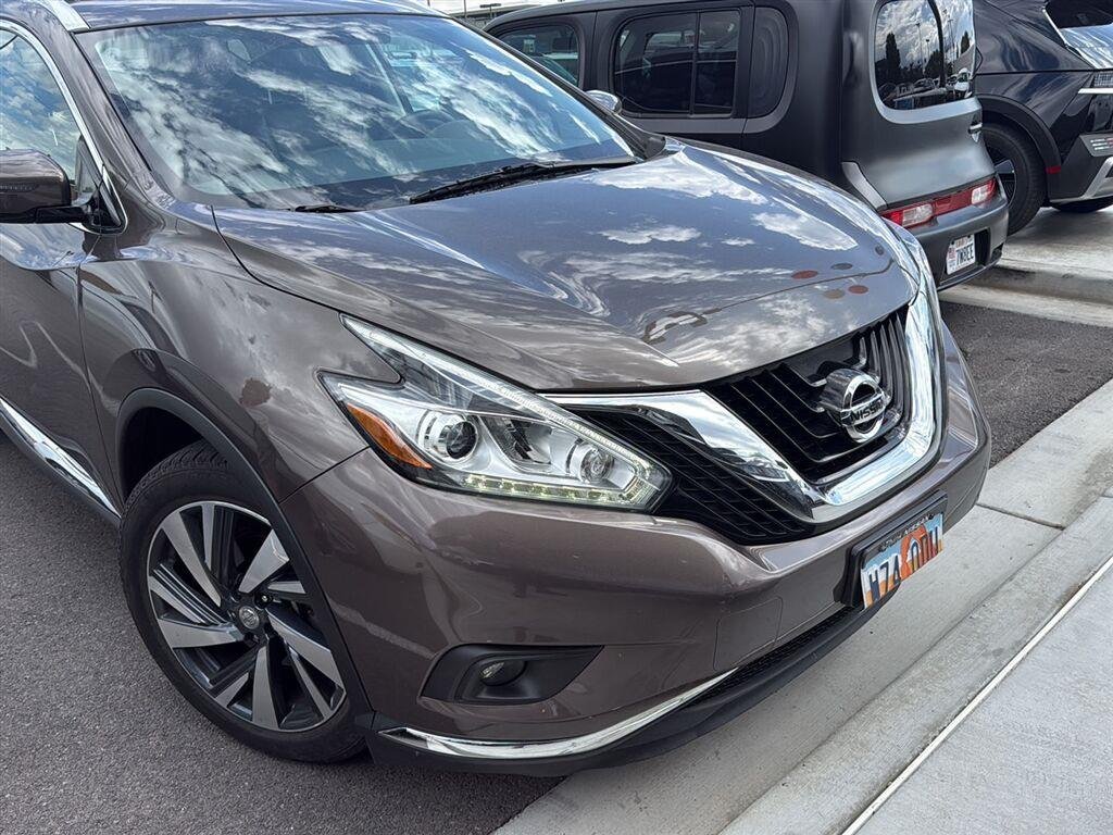 Used 2015 Java Metallic Nissan Platinum image 1
