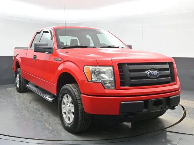 Used 2011 Red Ford STX image 1