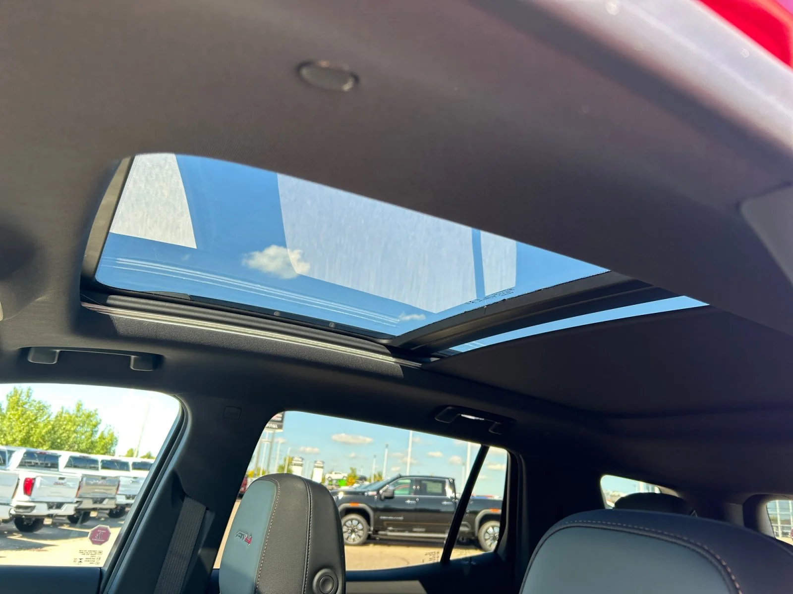 New 2027 Volcanic Red Tintcoat GMC AWD AT4 image 18