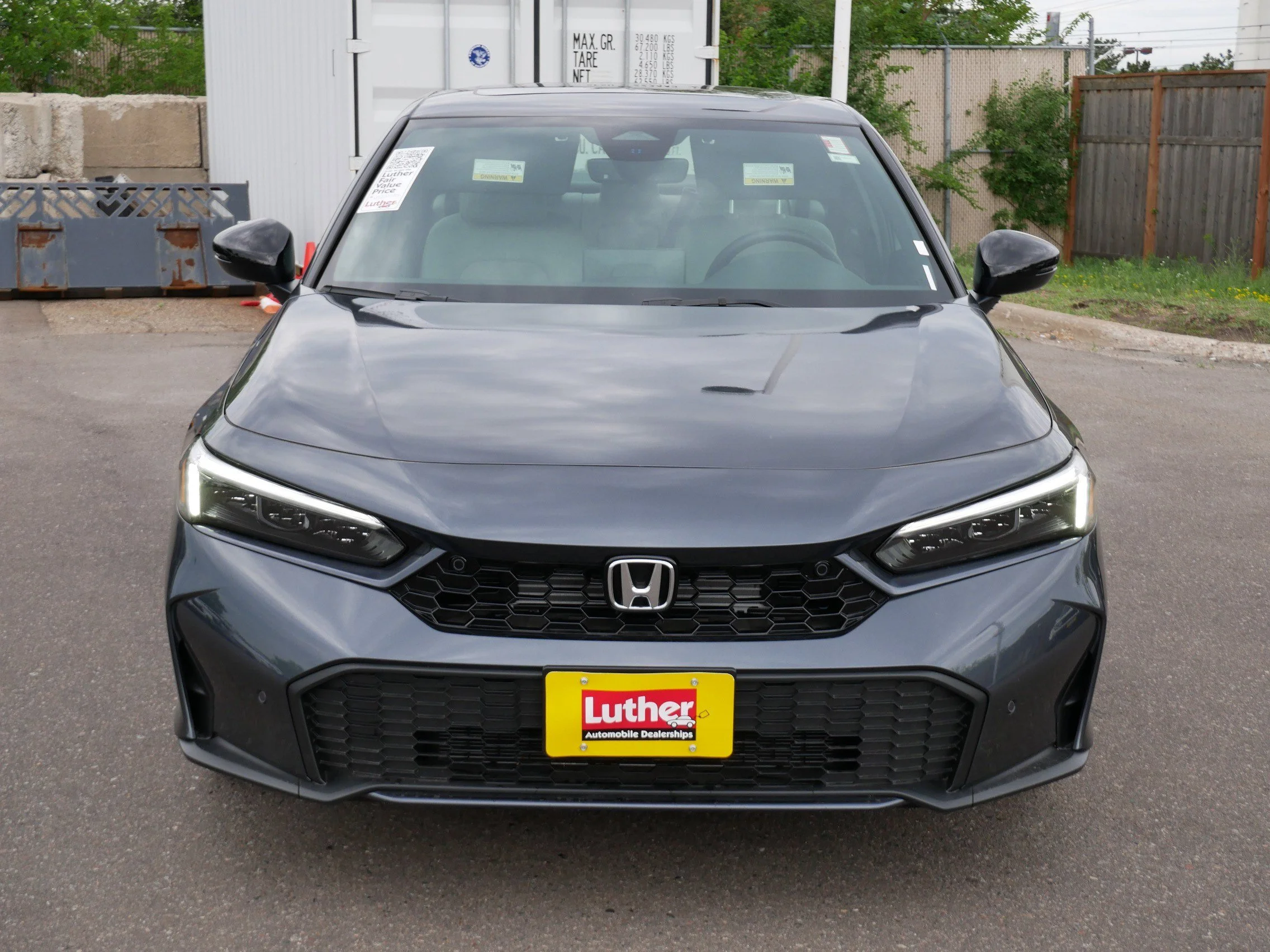 Certified 2026 Honda Civic Sport Touring with VIN 2HGFE4F86TH317525 for sale in Hopkins, Minnesota