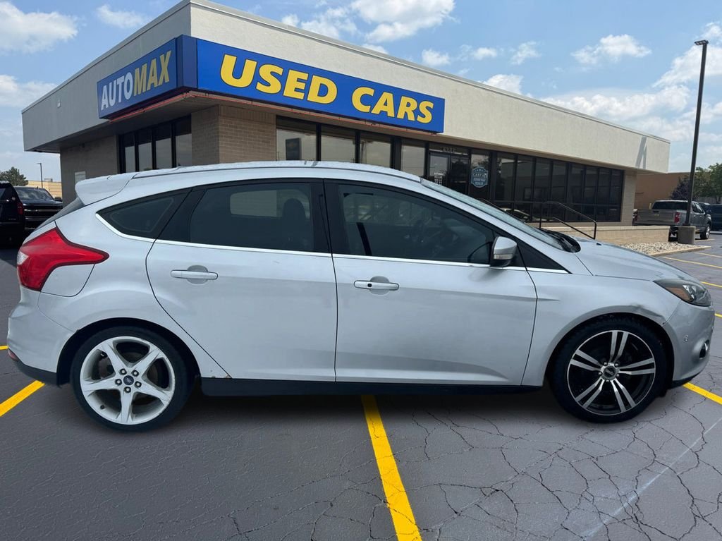 Used 2013 Ford Focus Titanium with VIN 1FADP3N25DL313001 for sale in Traverse City, MI