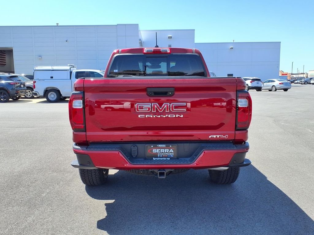 Used 2024 Volcanic Red Tintcoat GMC AT4 image 16