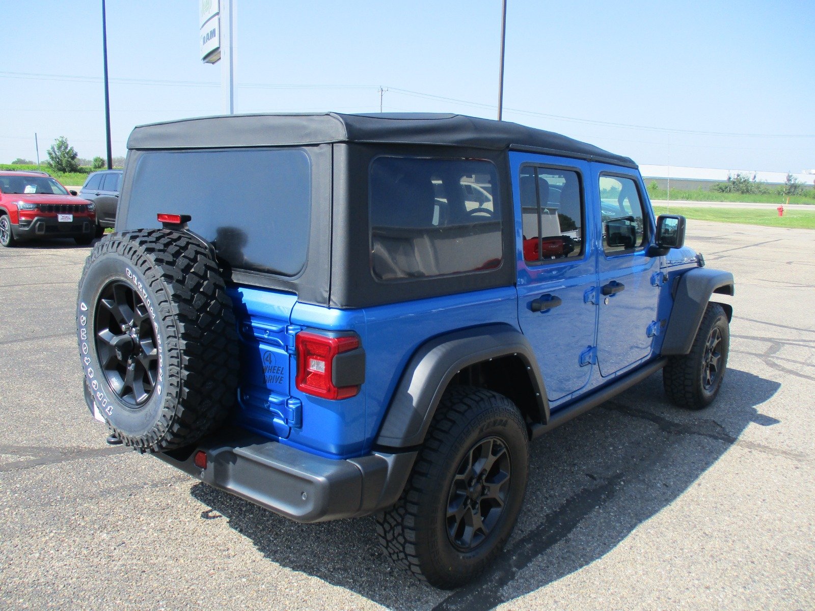 Used 2022 HYDRO BLUE Jeep Sport image 6