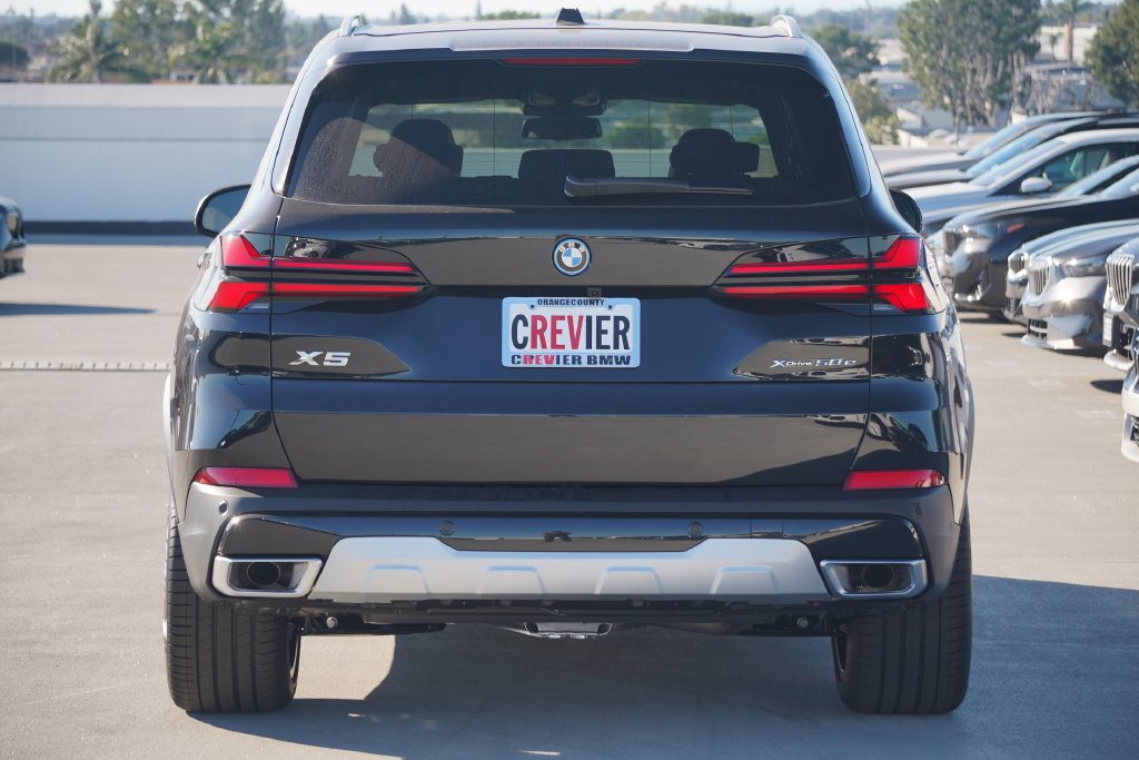 Used 2026 Black Sapphire Metallic BMW xDrive50e image 7