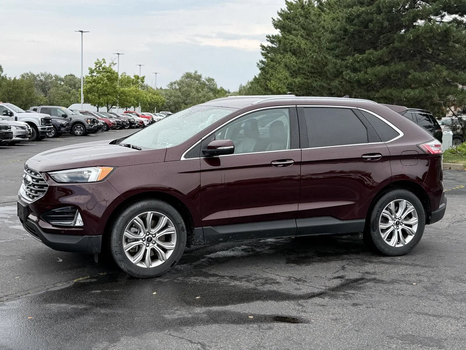 Used 2024 Burgundy Velvet Metallic Tinted Clearcoat Ford Titanium image 4