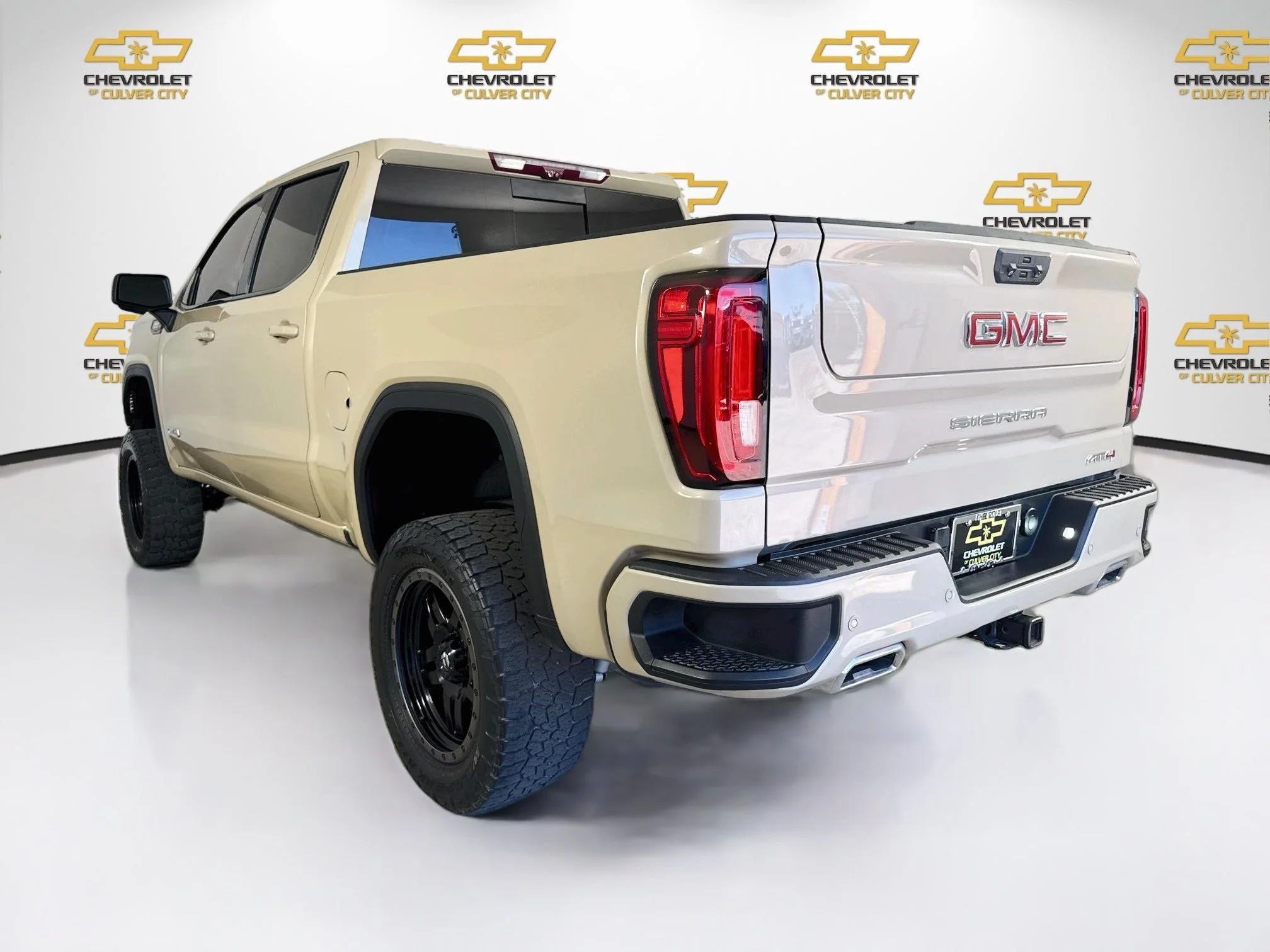 Used 2023 DESERT SAND METALLIC GMC AT4 image 6
