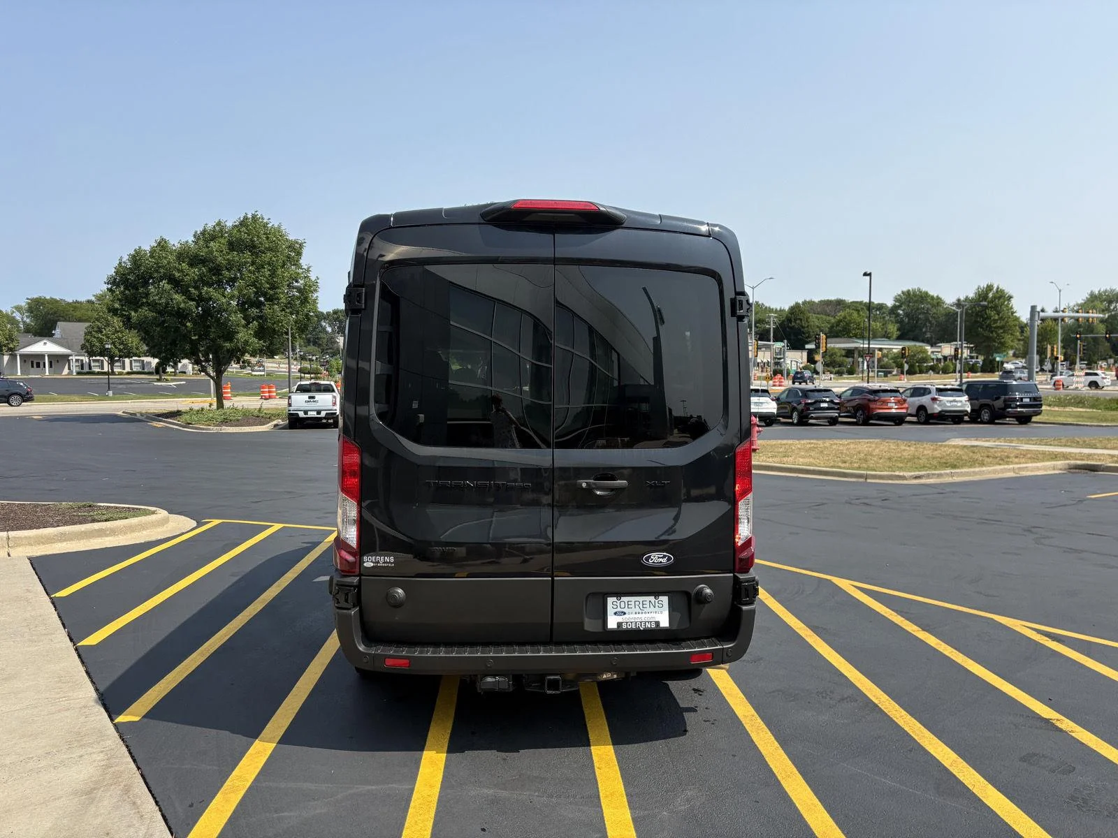 New 2026 Agate Black Metallic Ford Passenger Van XLT image 5