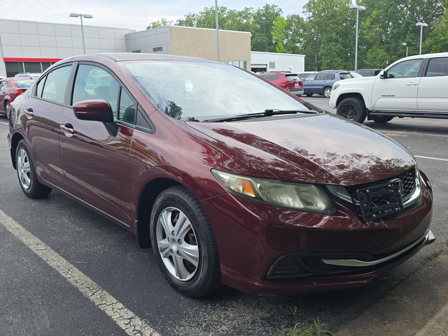 Used 2014 Crimson Pearl Honda LX image 1