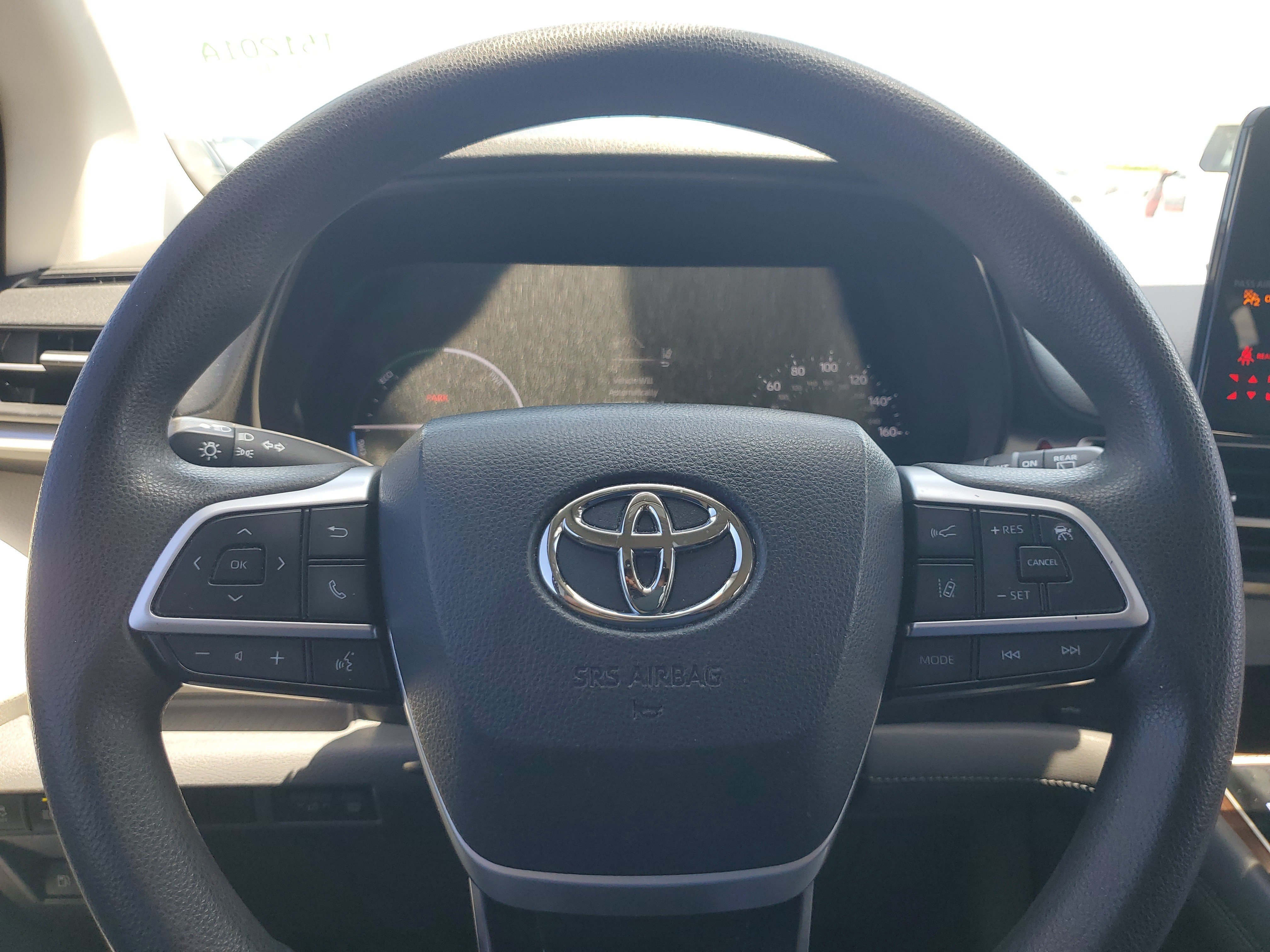 Used 2021 Sunset Bronze Toyota LE image 25
