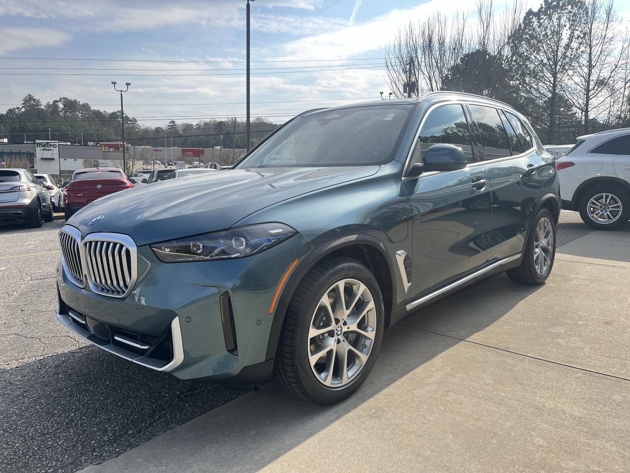 Used 2026 Blue Ridge Mountain Metallic BMW xDrive50e image 4