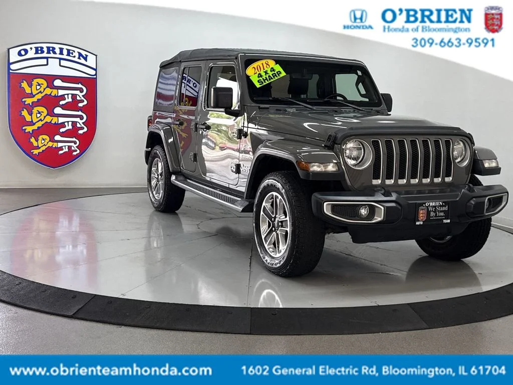 Used 2018 Gray Clearcoat Jeep Unlimited Sahara image 1