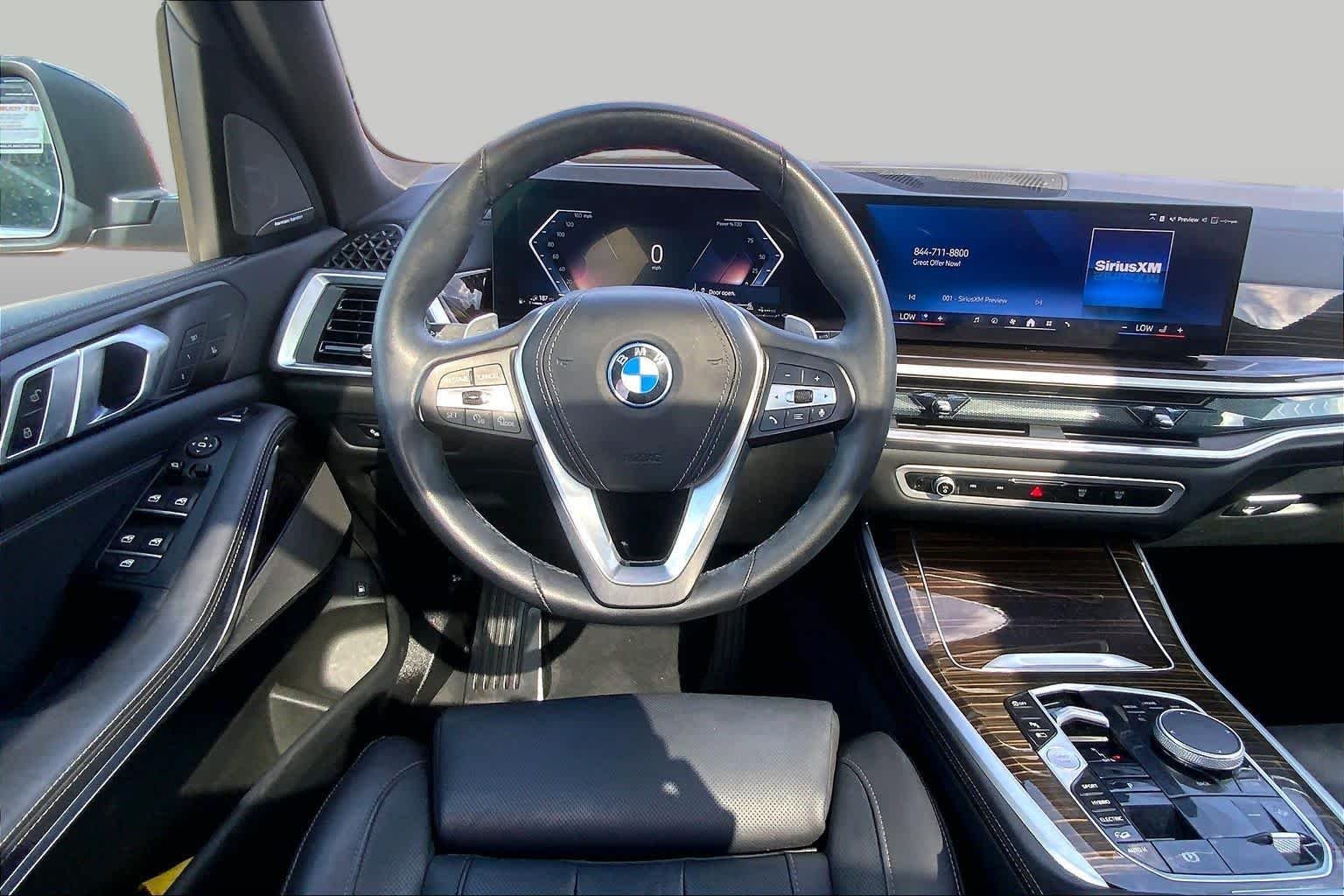 Used 2025 Black Sapphire Metallic BMW xDrive50e image 6