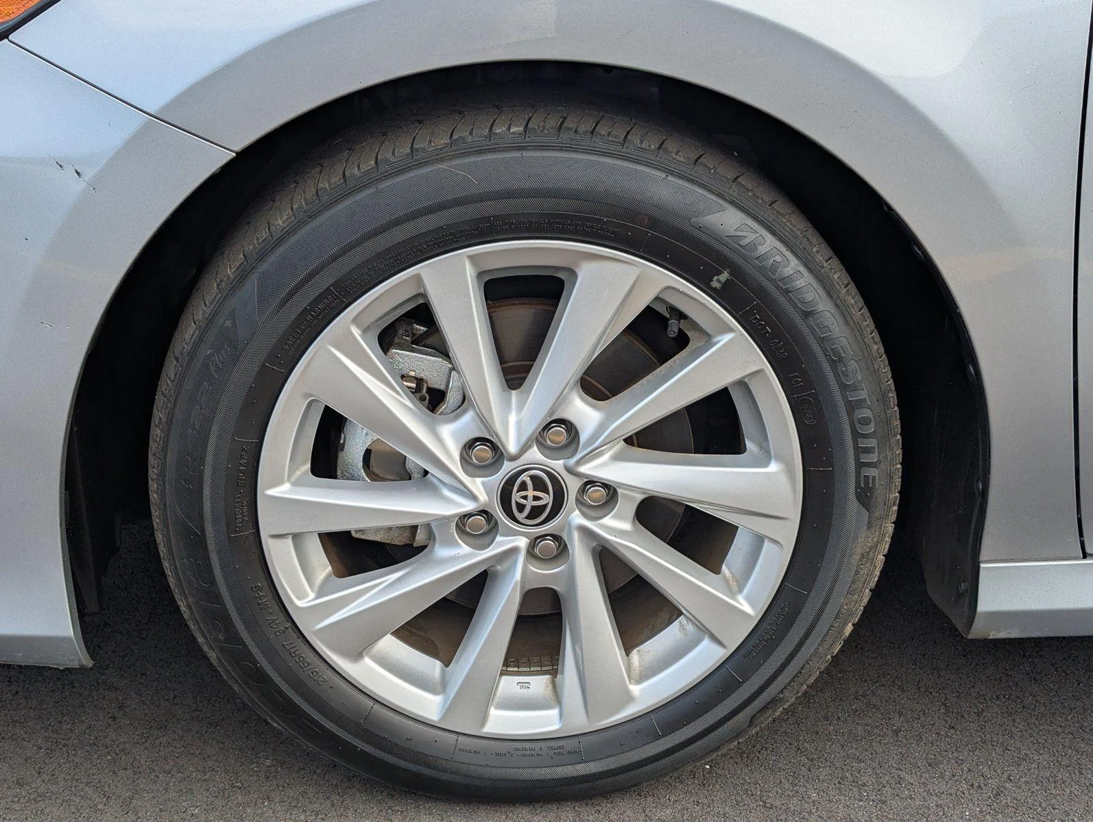 Used 2024 Celestial Silver Metallic Toyota LE image 9
