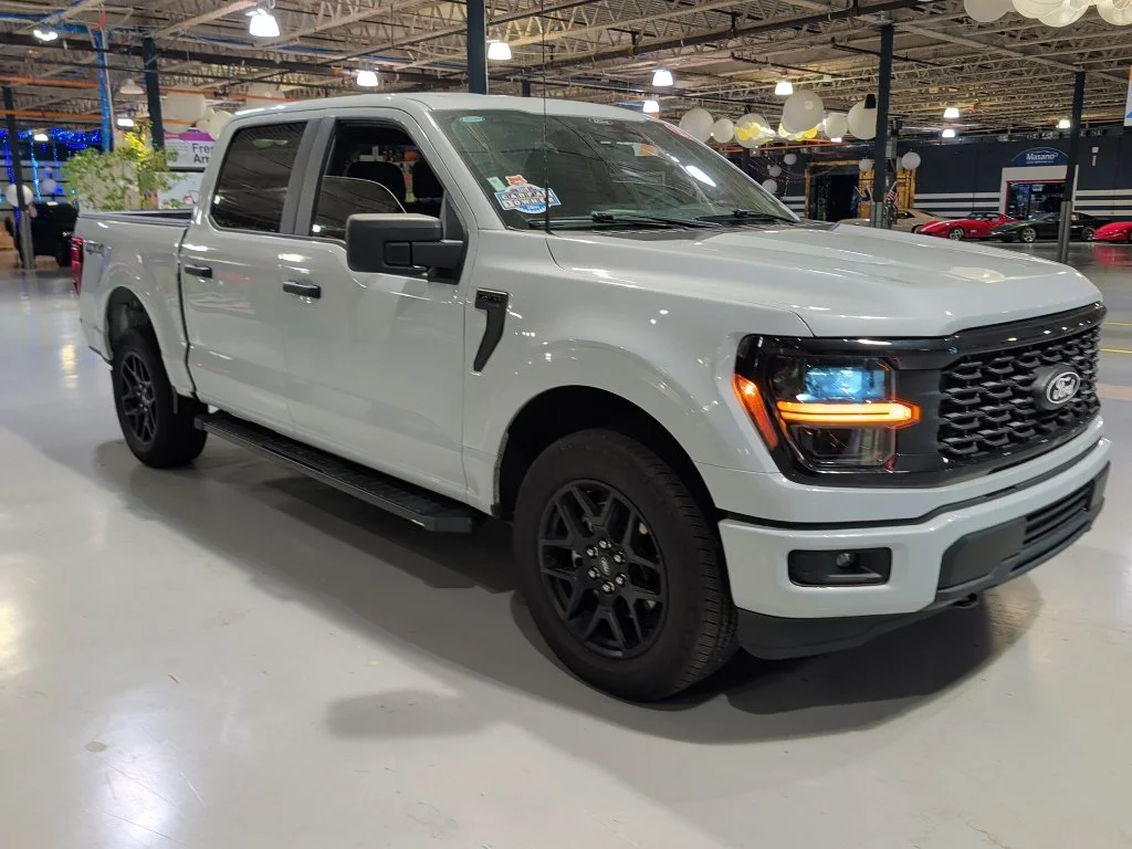Used 2025 White Metallic Ford STX image 1
