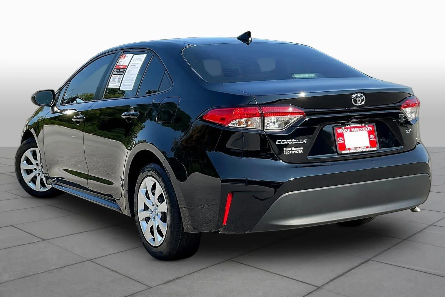 Used 2024 Midnight Black Metallic Toyota LE image 12