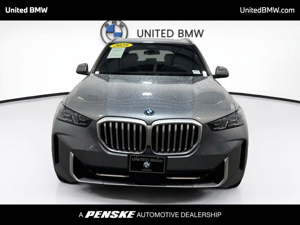 Used 2025 Skyscraper Grey Metallic BMW xDrive50e image 2