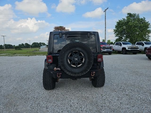 Used 2013 Black Jeep Unlimited Sahara image 7