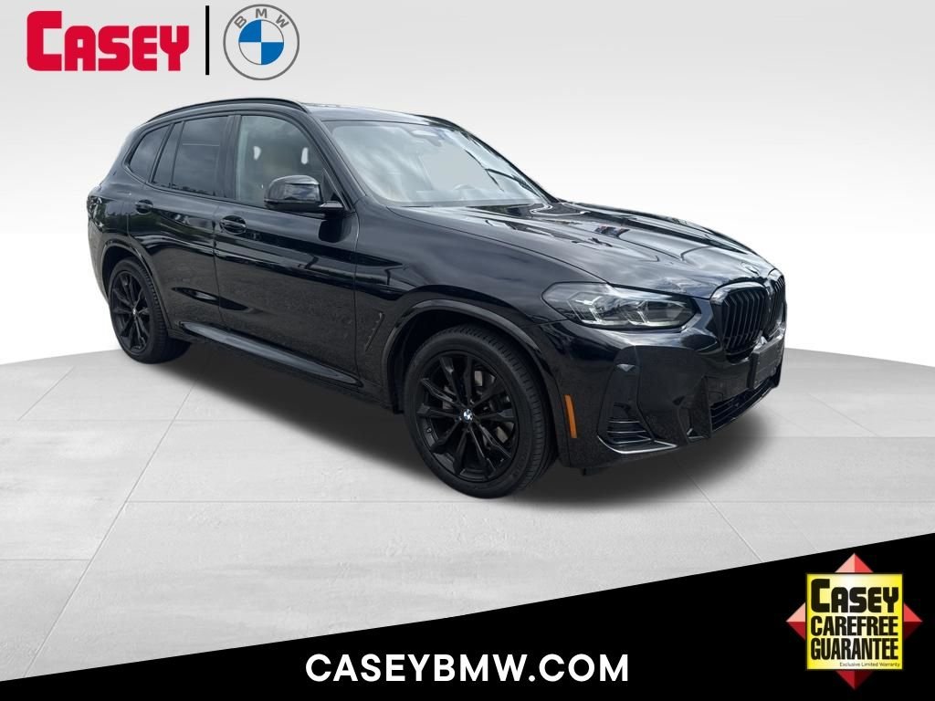 Used 2024 Black BMW sDrive30i image 1
