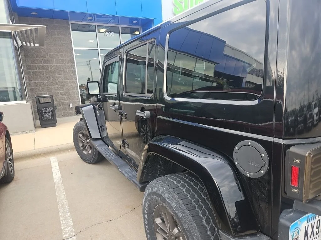 Used 2017 Black Jeep Unlimited Sahara image 6