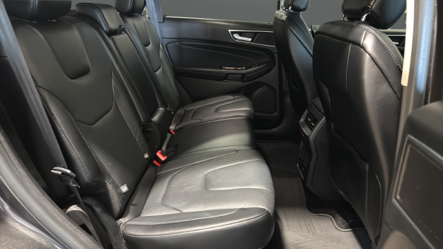 Used 2015 Magnetic Metallic Ford Titanium image 26