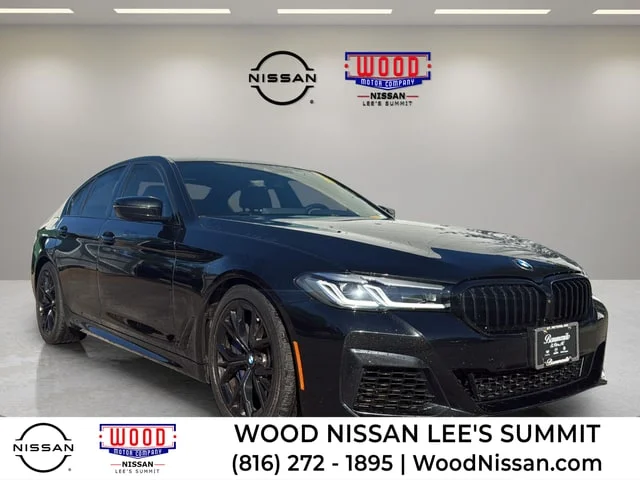 Used 2023 Black Sapphire Metallic BMW M550i xDrive image 1