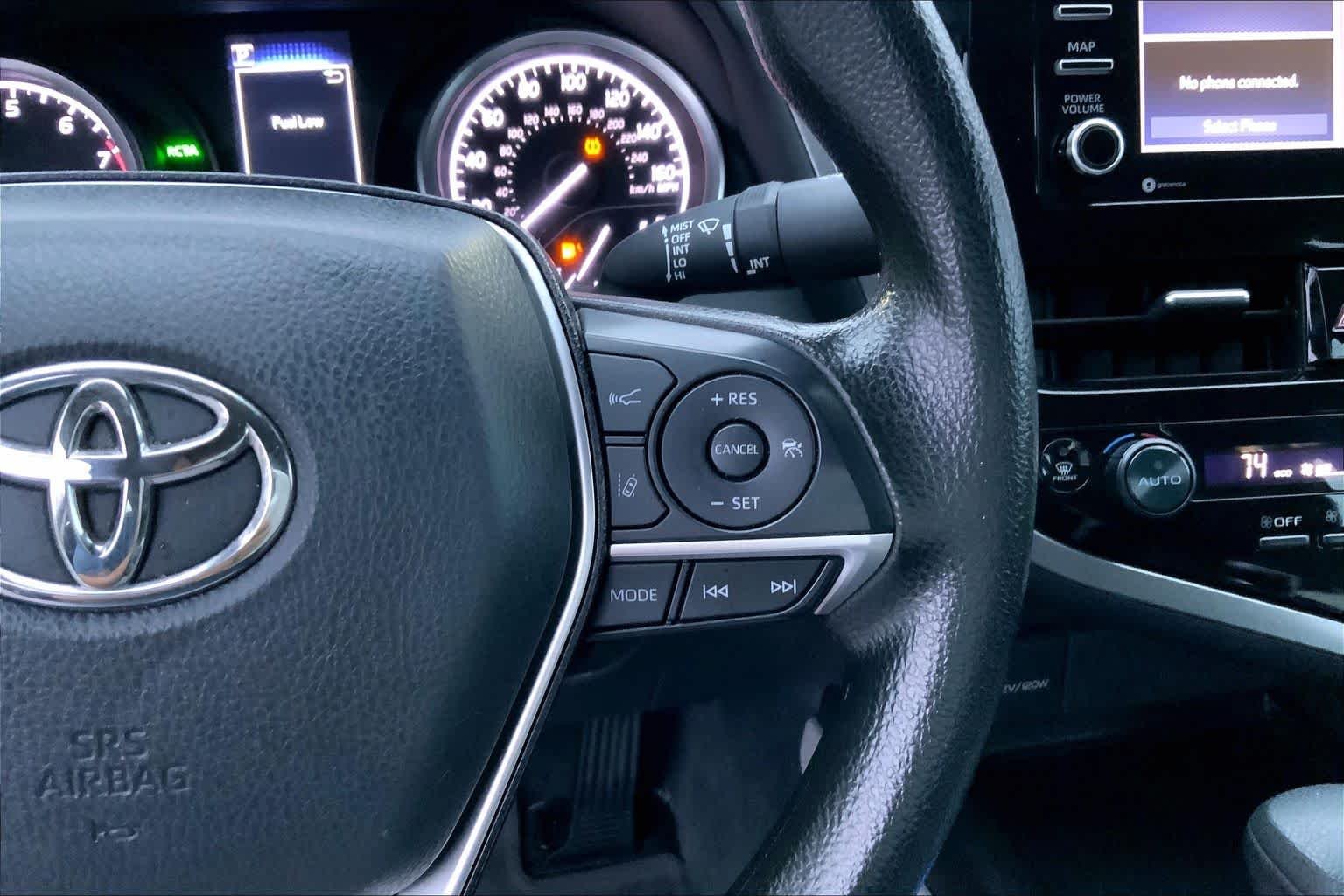 Used 2024 Midnight Black Metallic Toyota LE image 24