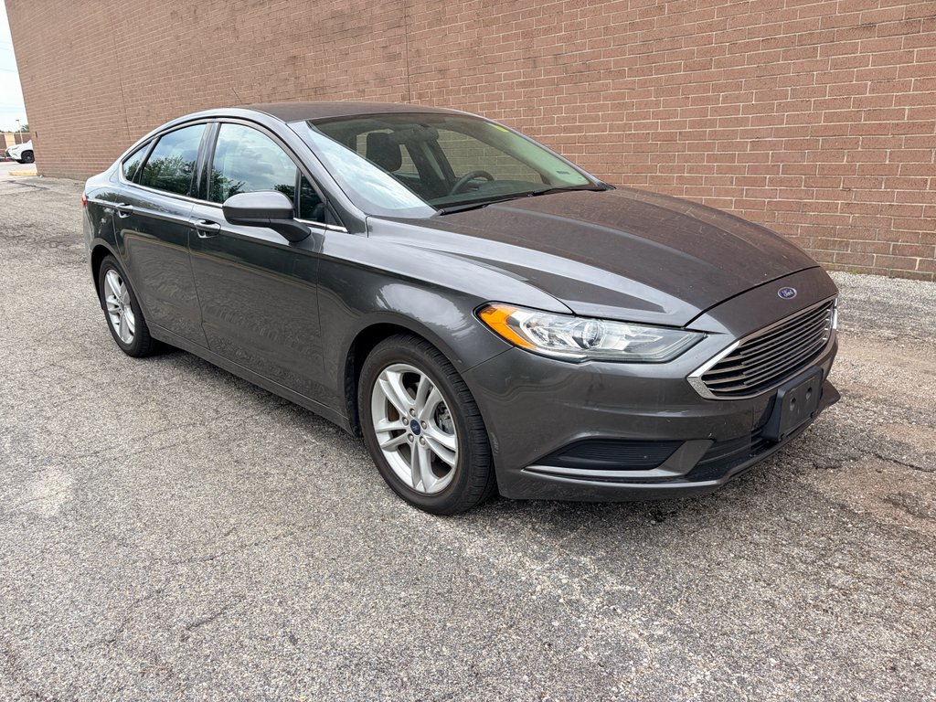 Used 2018 Magnetic Metallic Ford SE image 7